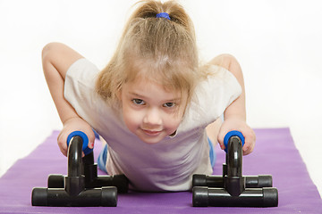 Image showing Four-year girl pressed the palm