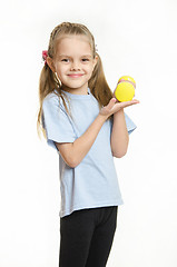 Image showing Girl holding a dumbbell