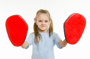 Image showing The girl put on hand paws boxing