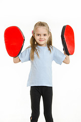 Image showing Girl athlete with boxing paws