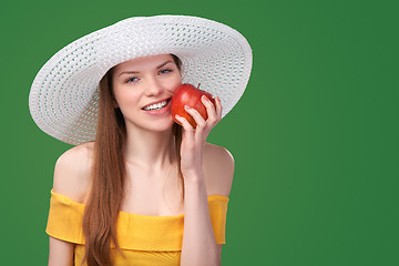 Image showing Woman holding red apple