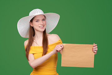 Image showing Woman with parcel