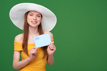 Image showing Woman with blank envelope