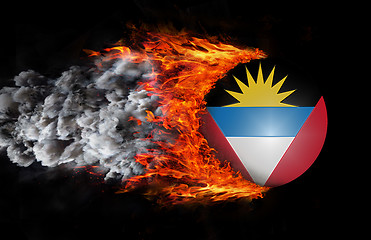 Image showing Flag with a trail of fire and smoke - Antigua and Barbuda