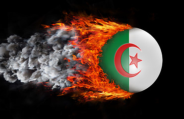 Image showing Flag with a trail of fire and smoke - Algeria