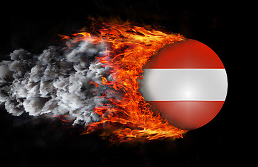 Image showing Flag with a trail of fire and smoke - Austria