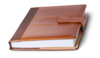 Image showing Closed notebook in leather cover rotated