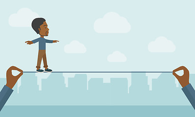 Image showing Black Businessman walking on wire.