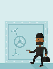 Image showing Man in black hacking bank safe.