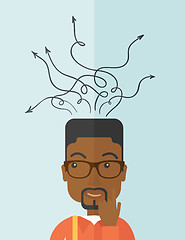 Image showing Confused black businessman standing with many arrows.