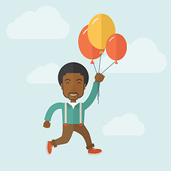 Image showing Young black man flying with balloons.