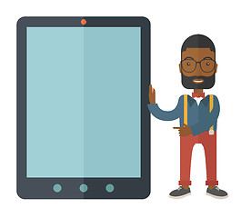 Image showing Black businessman holding a big screen tablet.