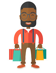 Image showing Funny black businessman with shopping bags