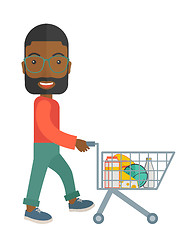 Image showing Black Male Shopper Pushing a Shopping Cart.