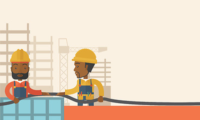 Image showing Two black young builders.