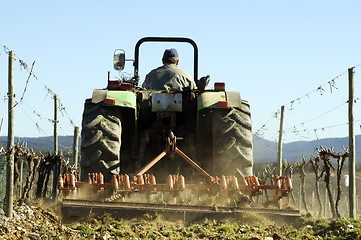 Image showing  Tractor ploughing field