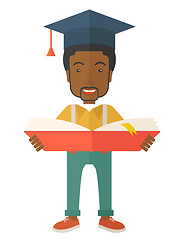 Image showing Black man standing with graduation cap.