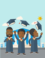 Image showing Three men throwing graduation cap.