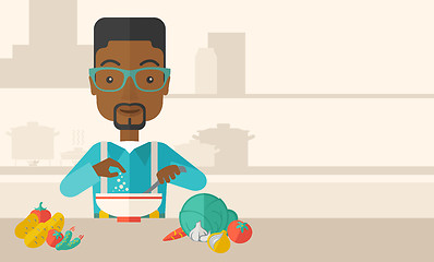 Image showing Young black guy is eating salad for lunch in the restaurant.