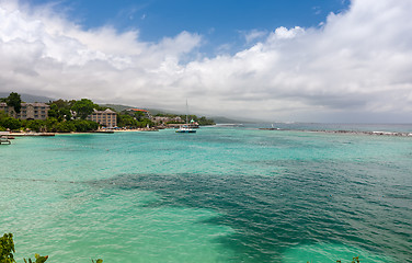 Image showing Beach on tropical island. Clear blue water and sky 