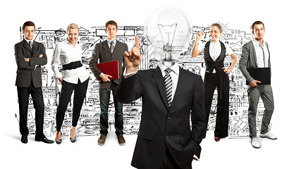 Image showing Business Team With Lamp Head