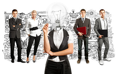 Image showing Business Team With Lamp Head