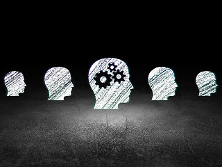 Image showing Finance concept: head with gears icon in grunge dark room