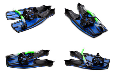 Image showing Set of blue swim fins, mask and snorkel for diving on white back