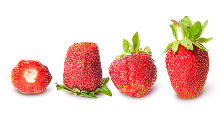 Image showing Four strawberries in a row