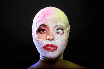 Image showing Beauty Concept of Heavy Makeup Seeping Through Gauze