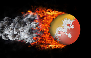 Image showing Flag with a trail of fire and smoke - Bhutan