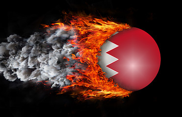 Image showing Flag with a trail of fire and smoke - Bahrain