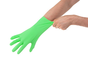 Image showing Hand in green glove