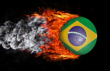 Image showing Flag with a trail of fire and smoke - Brazil