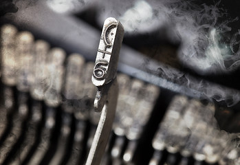 Image showing 6 hammer - old manual typewriter - mystery smoke