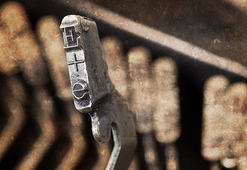 Image showing E hammer - old manual typewriter - warm filter