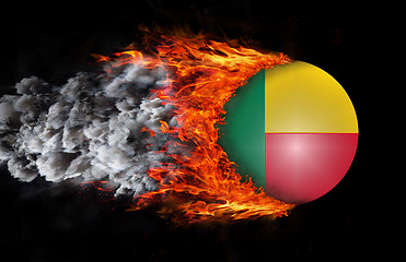 Image showing Flag with a trail of fire and smoke - Benin