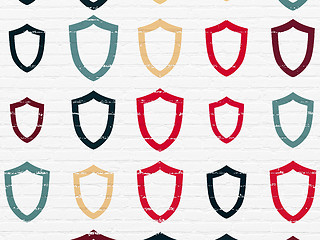 Image showing Privacy concept: Contoured Shield icons on wall background