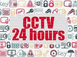 Image showing Security concept: CCTV 24 hours on wall background