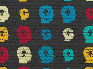 Image showing Information concept: Head With Light Bulb icons on wall background