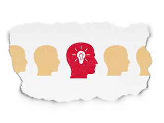Image showing Business concept: head with light bulb icon on Torn Paper background