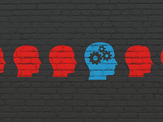 Image showing Business concept: head with gears icon on wall background