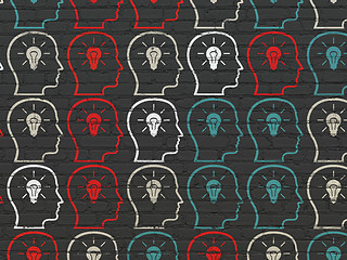 Image showing Advertising concept: Head With Lightbulb icons on wall background