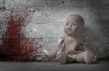 Image showing Concept of child abuse - Bloody doll