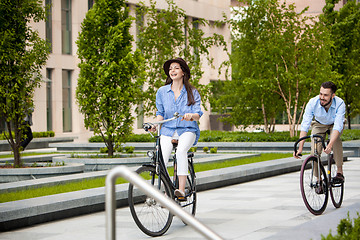 Image showing Romantic date of young couple on bicycles