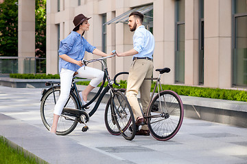 Image showing Romantic date of young couple on bicycles