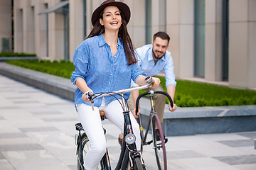 Image showing Romantic date of young couple on bicycles