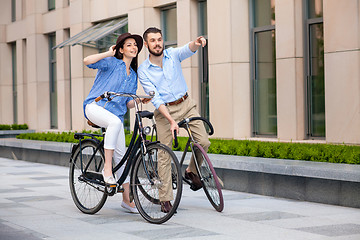 Image showing Romantic date of young couple on bicycles