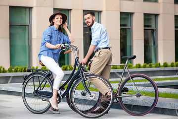 Image showing Romantic date of young couple on bicycles