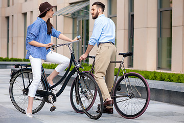 Image showing Romantic date of young couple on bicycles